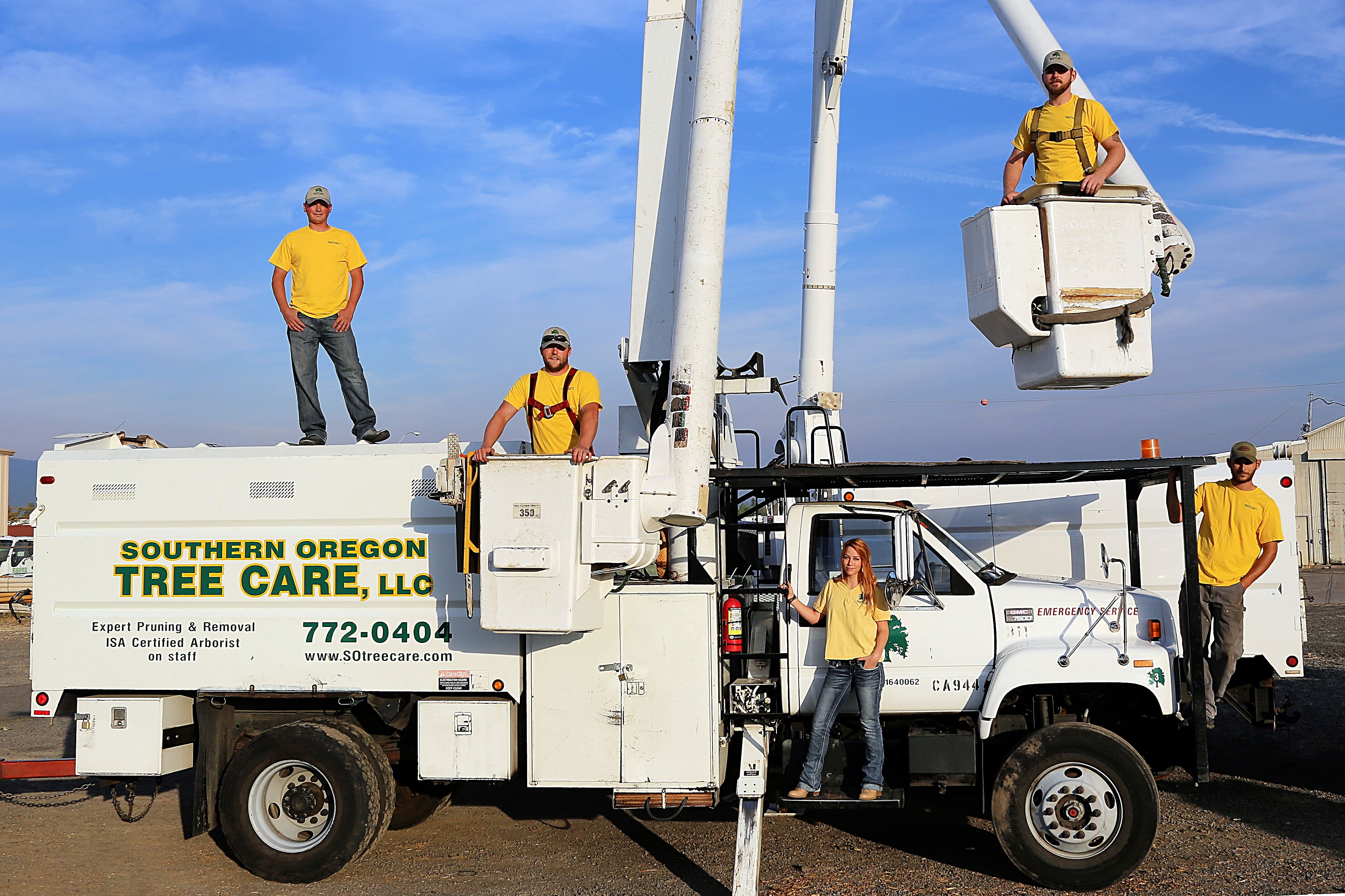 Southern Oregon Tree Care team in a bucket truck